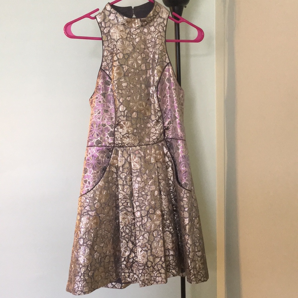 Party dress with open back and pockets!